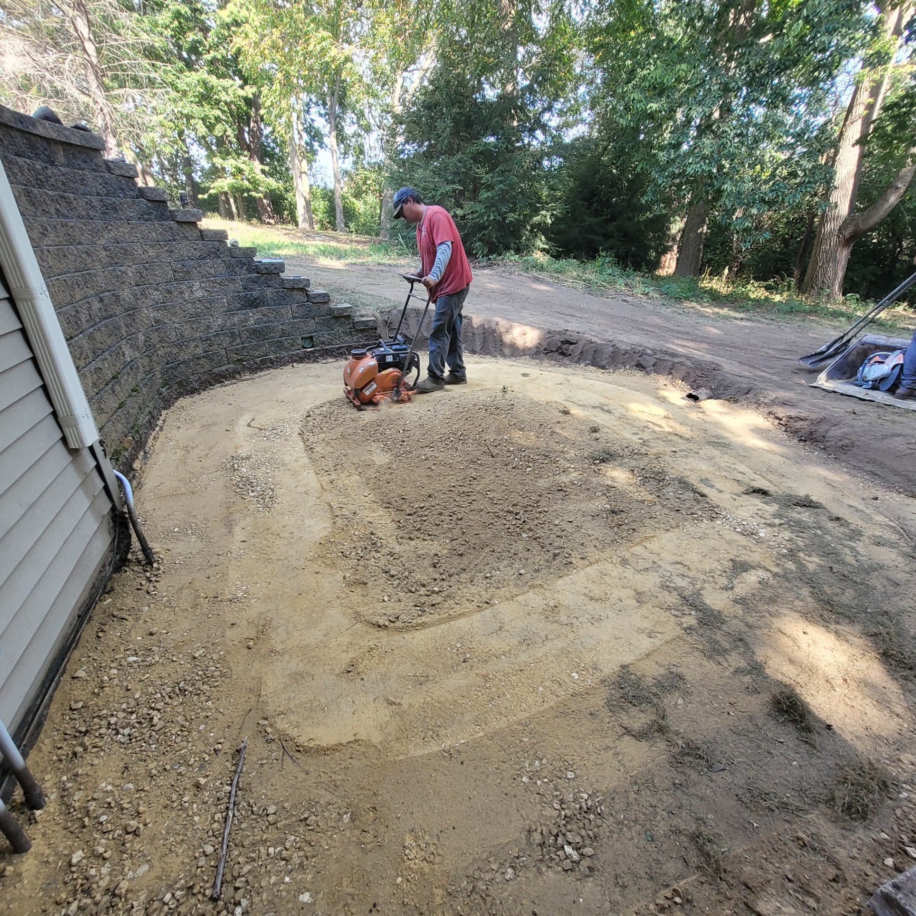 Compacting Base Course Landscapes by Michelle | Landscape Design & Installation Rockford IL